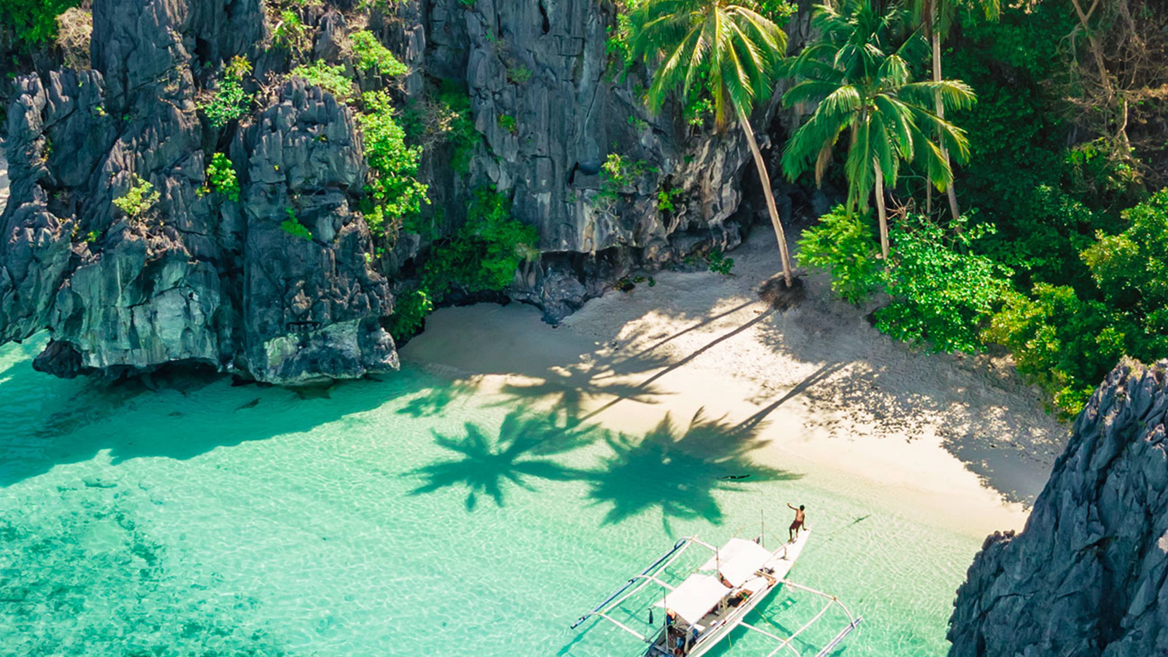 Beautiful Entalula Island Beach Lagoon with typical filipino