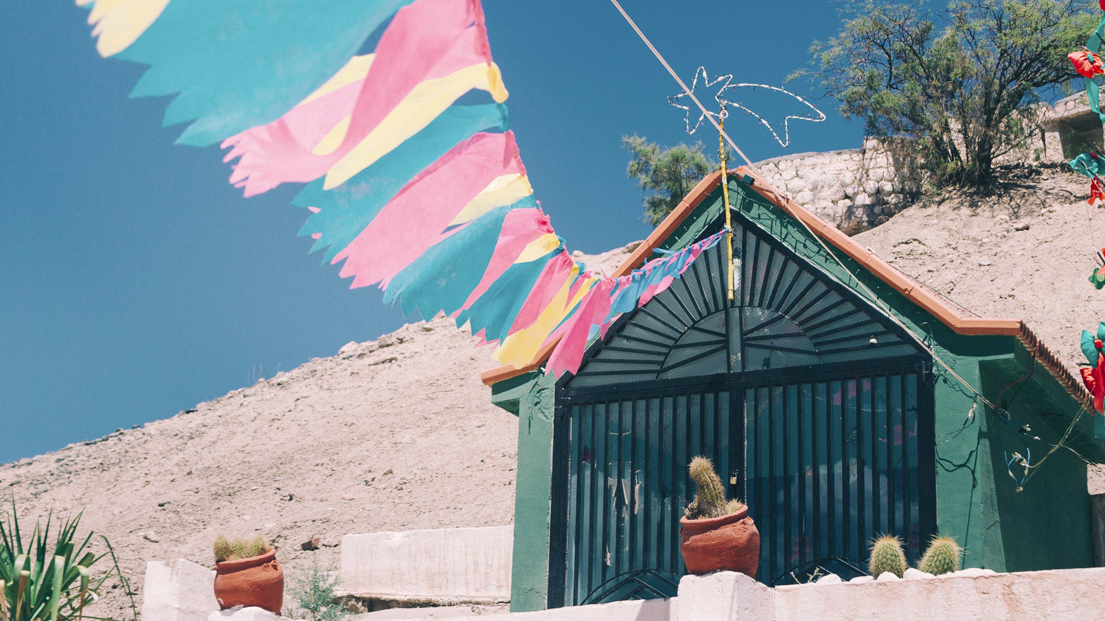 Little shrine with color pennants in Catamarca, Argentina