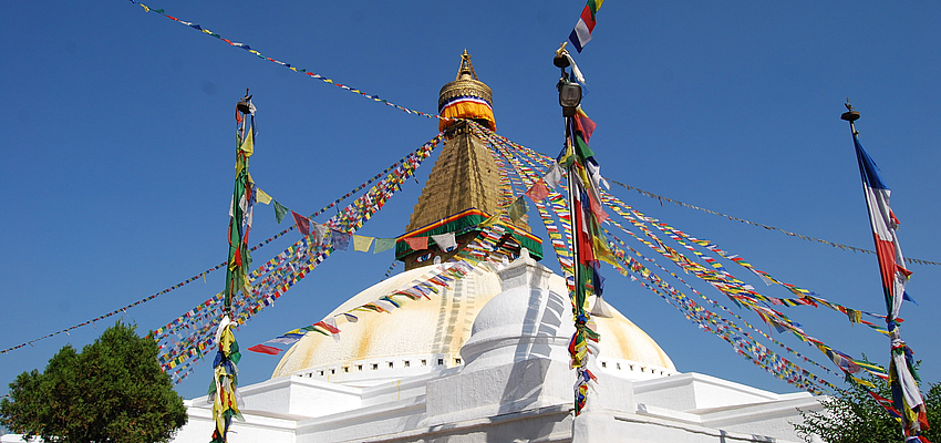 Go round stupas in an anti-clockwise direction